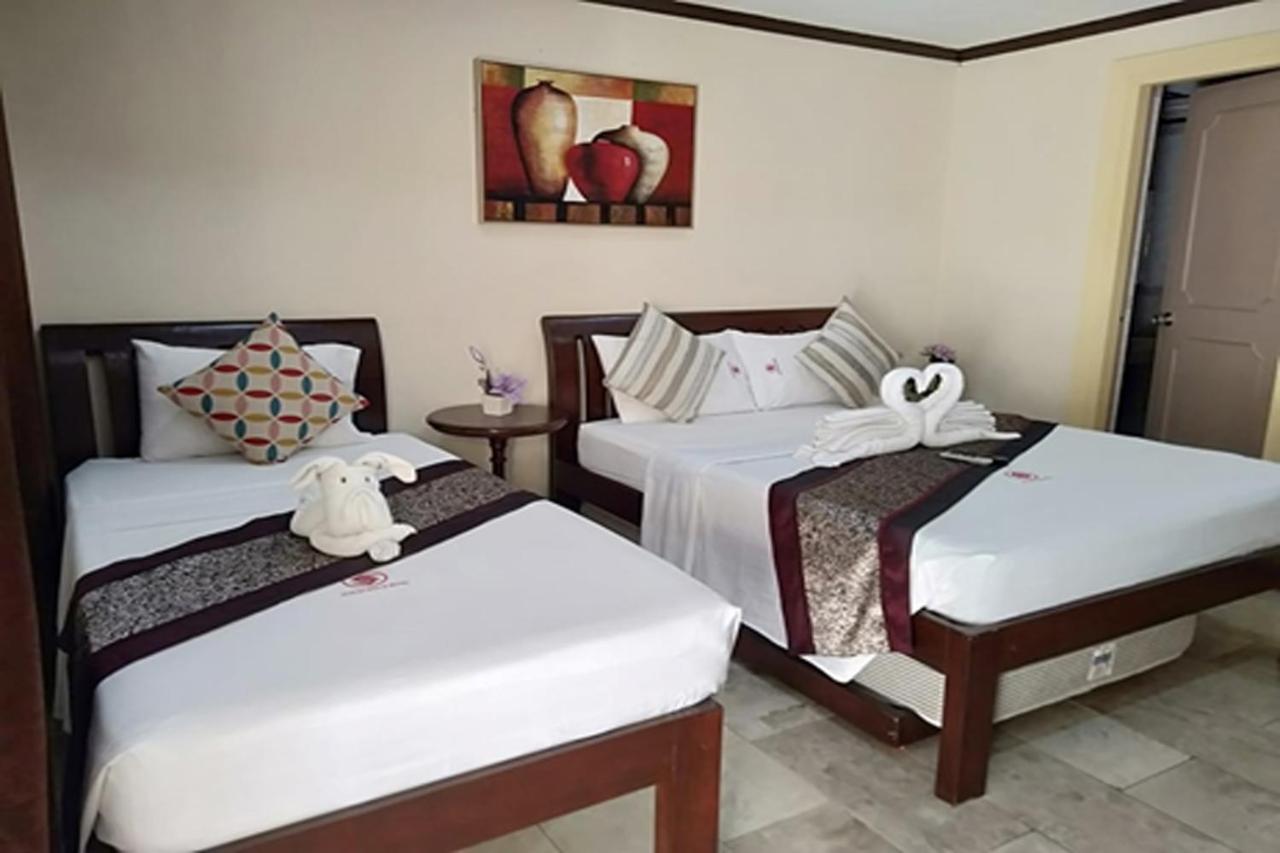 Suzuki Beach Hotel โอลองกาโป ภายนอก รูปภาพ